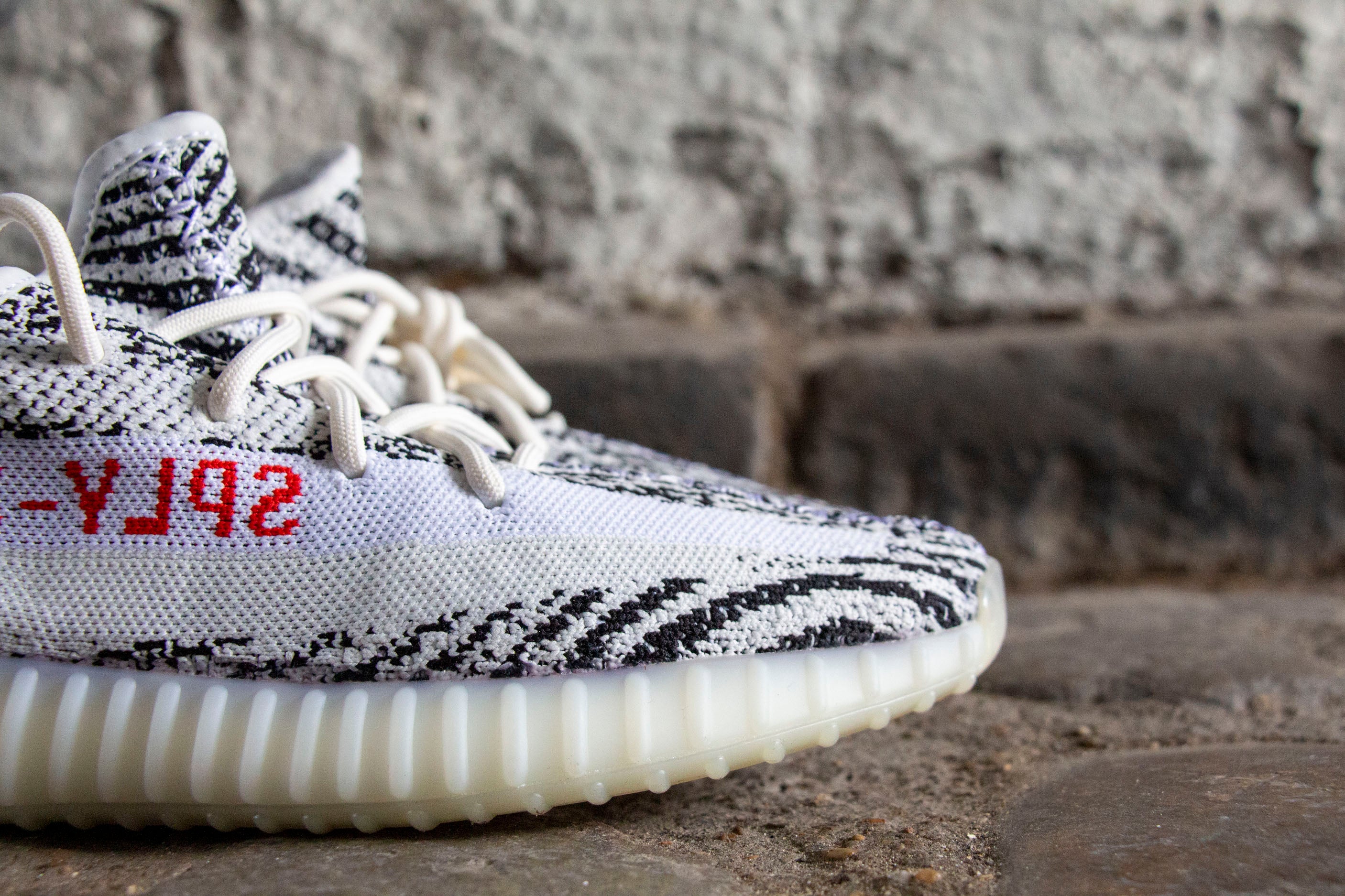 Flight club zebra yeezy outlet
